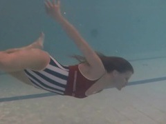 Find-Best-Ass.com presents: Leggy girl swims and strips naked in pool