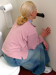 Find-Best-Ass.com presents: Blonde girl Jamie sits on the toilet and blows a black gloryhole dong